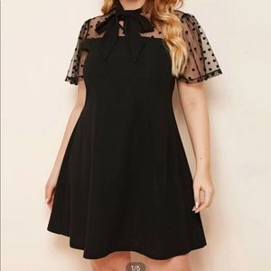Beautiful black dress with polka dot detail